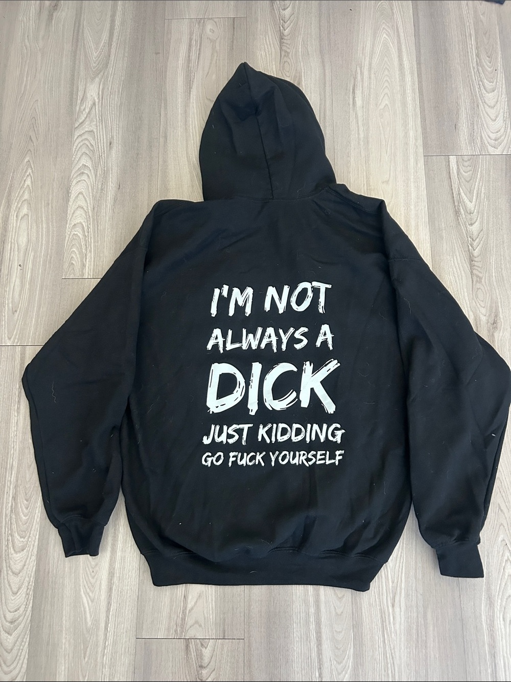 Black Hoodie with Bold White Slogan